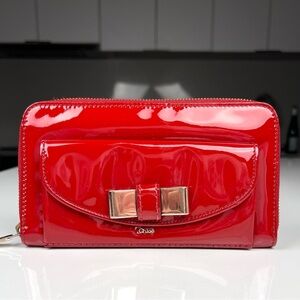 Chloé Red Patent Leather Bow Zip Wallet with Gold Bow Accent